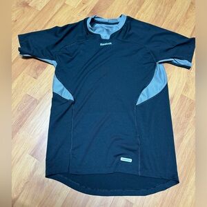 Reebok sport undershirt . Small men or medium women. Dryfit like material . GUC